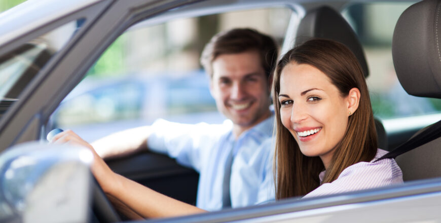 Young,Couple,Sitting,In,Car